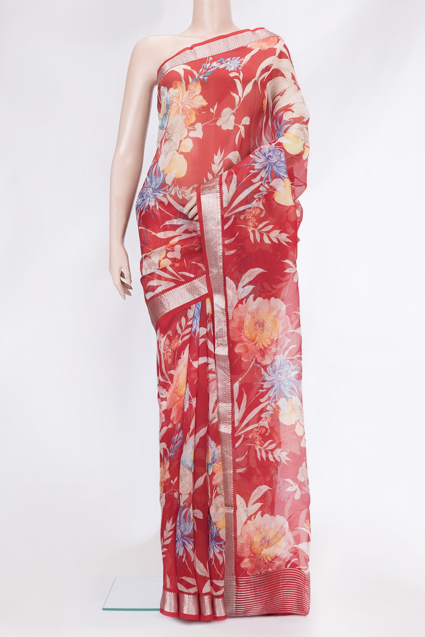 Red Dual Tone Organza Silk Saree with Printed design on the body and Zari Border.  displayed on a mannequin