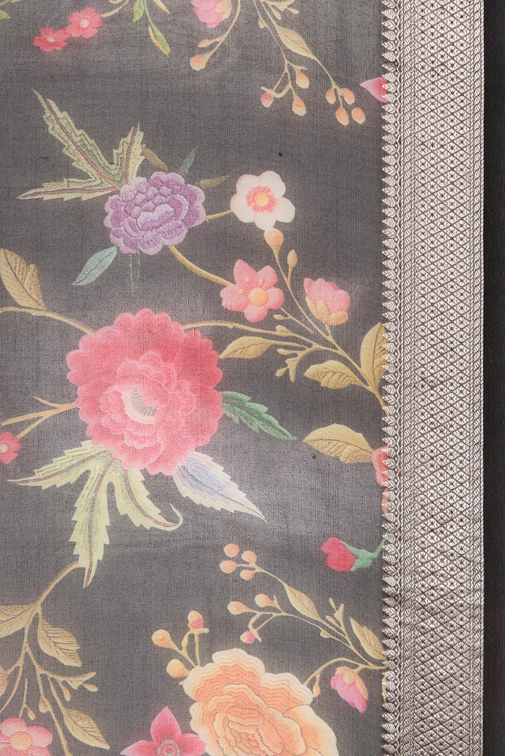 Border image of Black Dual Tone Organza Silk Saree with Printed design on the body and Zari Border. 