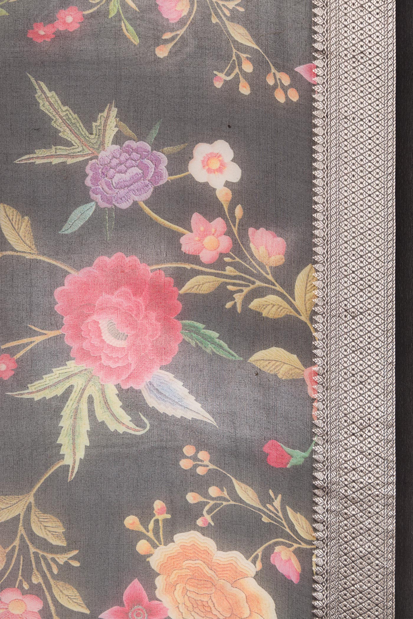 Border image of Black Dual Tone Organza Silk Saree with Printed design on the body and Zari Border. 