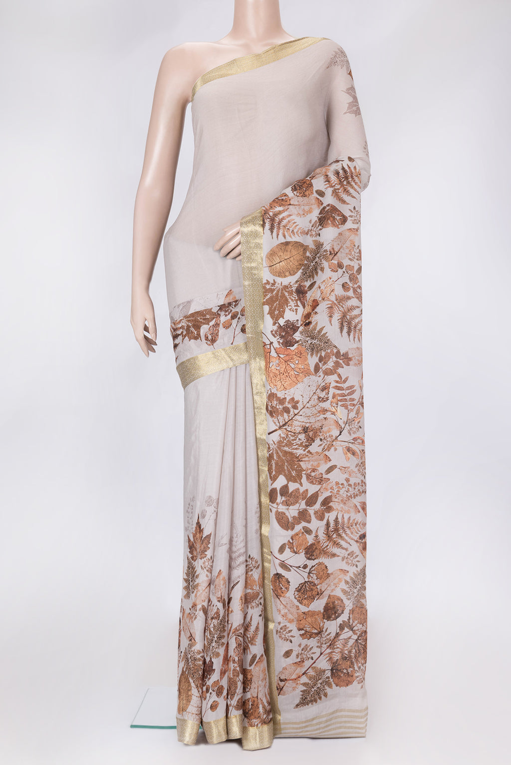 Grey Dual Tone Mysore Chiffon Saree with Printed design on the body and Zari Border.  displayed on a mannequin