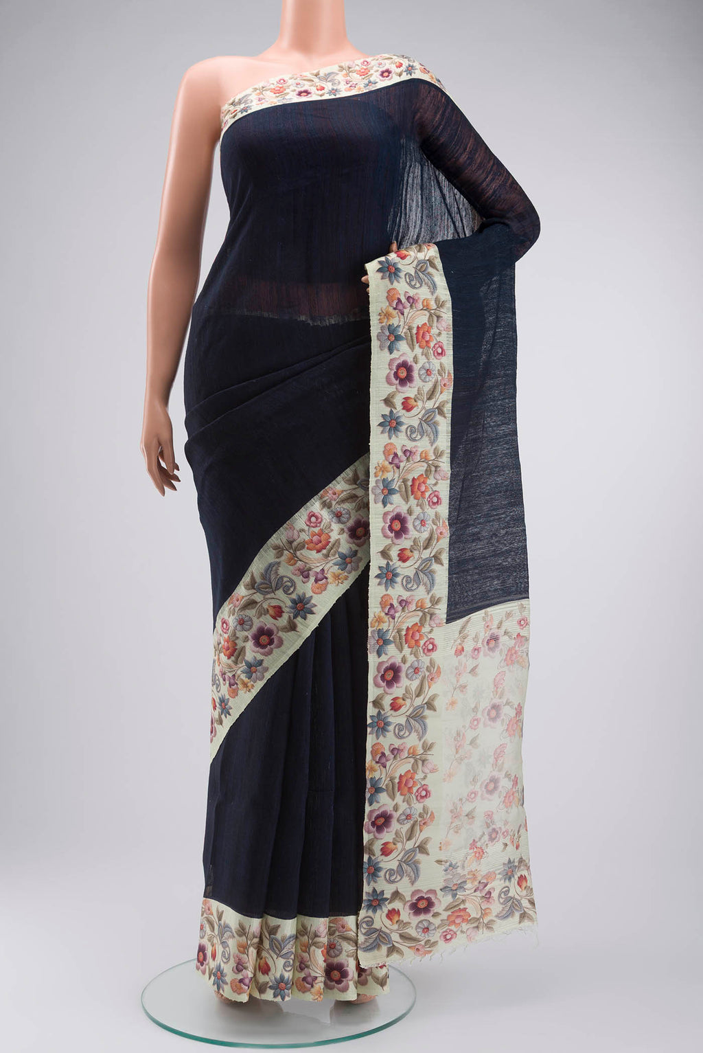 Blue Tussar Silk Saree with Plain Body and Printed Border displayed on a mannequin