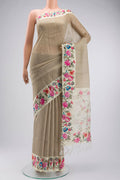 Beige Tussar Silk Saree with Plain Body and Printed Border displayed on a mannequin