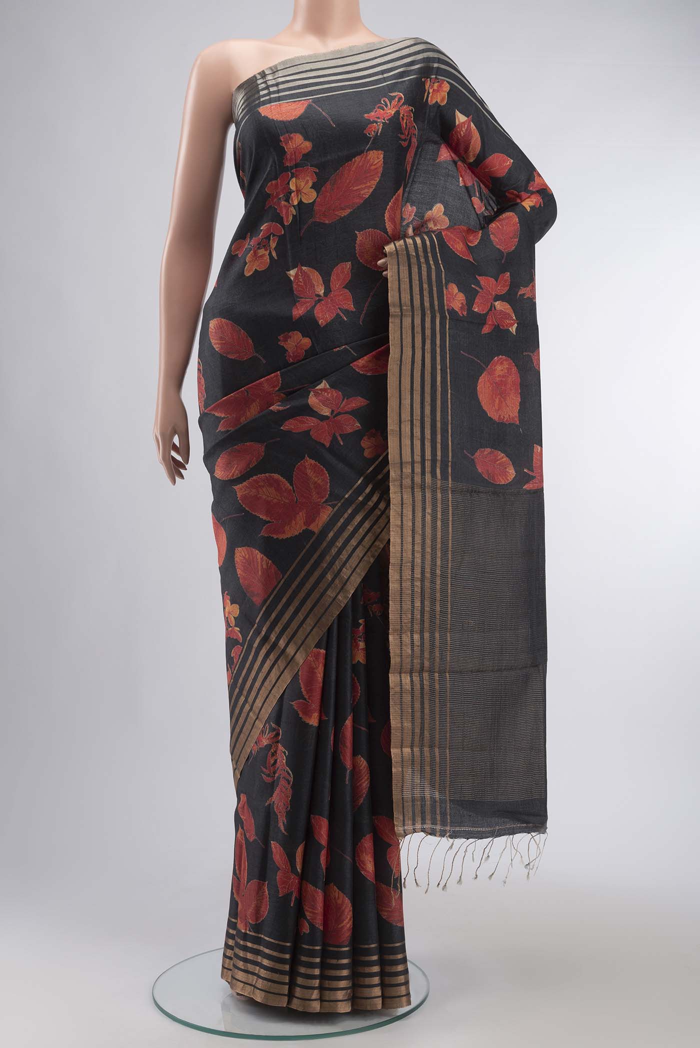 Black Bhagalpuri Tussar Silk Saree with Floral Print on the body and Zari Border displayed on a mannequin