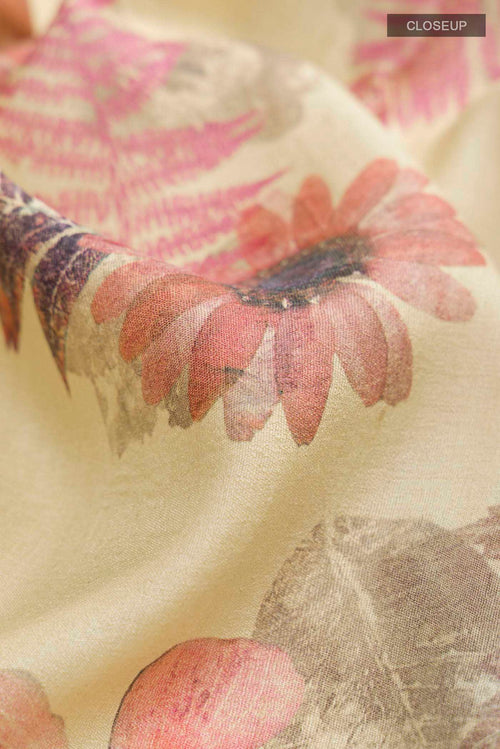 Close up of Beige Bhagalpuri Tussar Silk Saree with Floral Print on the body and Zari Border displaying folds