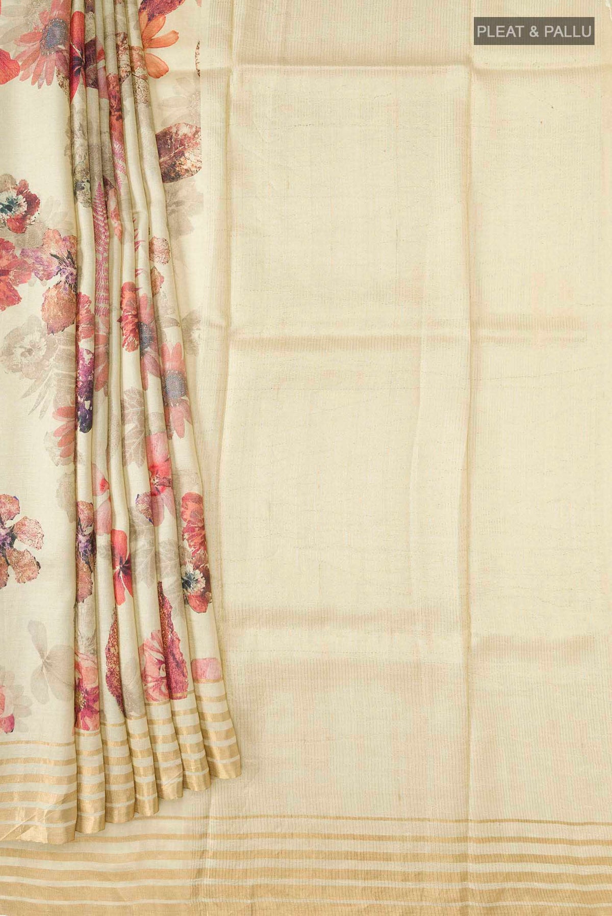 Pleats and pallu of Beige Bhagalpuri Tussar Silk Saree with Floral Print on the body and Zari Border