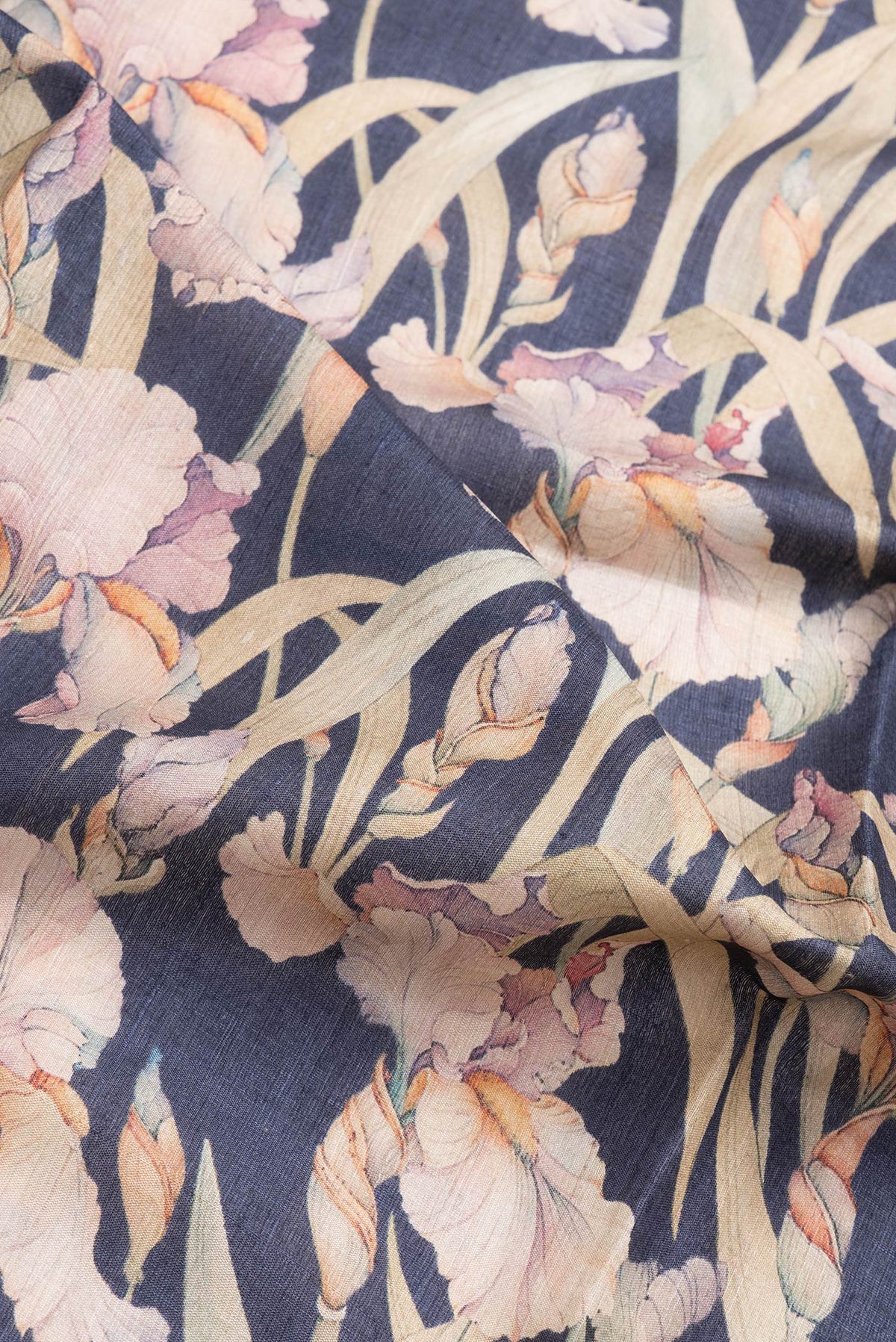 Close up of Navy Blue Dual Tone Tussar Silk Saree with Printed design on the body and Zari Border.  displaying folds