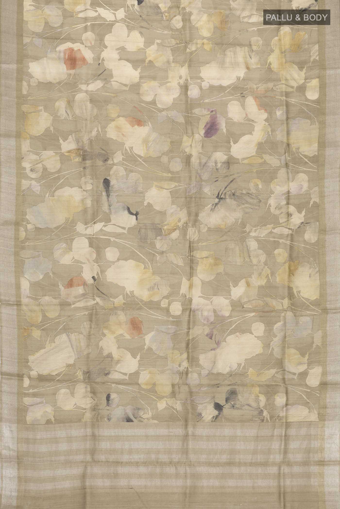 Flat view of Beige Tussar Silk Saree with Printed design on the body and Zari Border