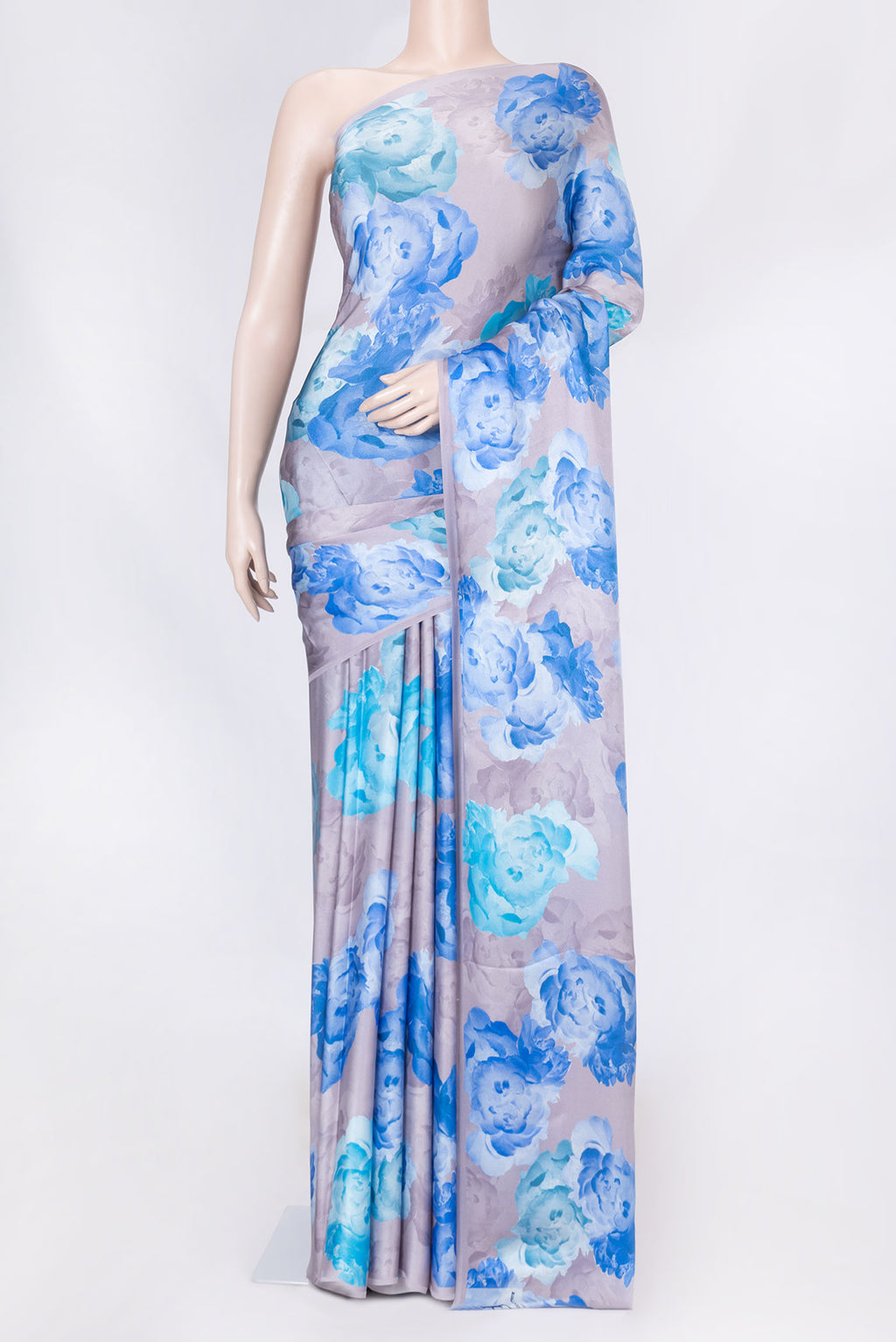 Brown Dual Tone Mysore Crepe Saree with Printed design on the body and Without Border displayed on a mannequin