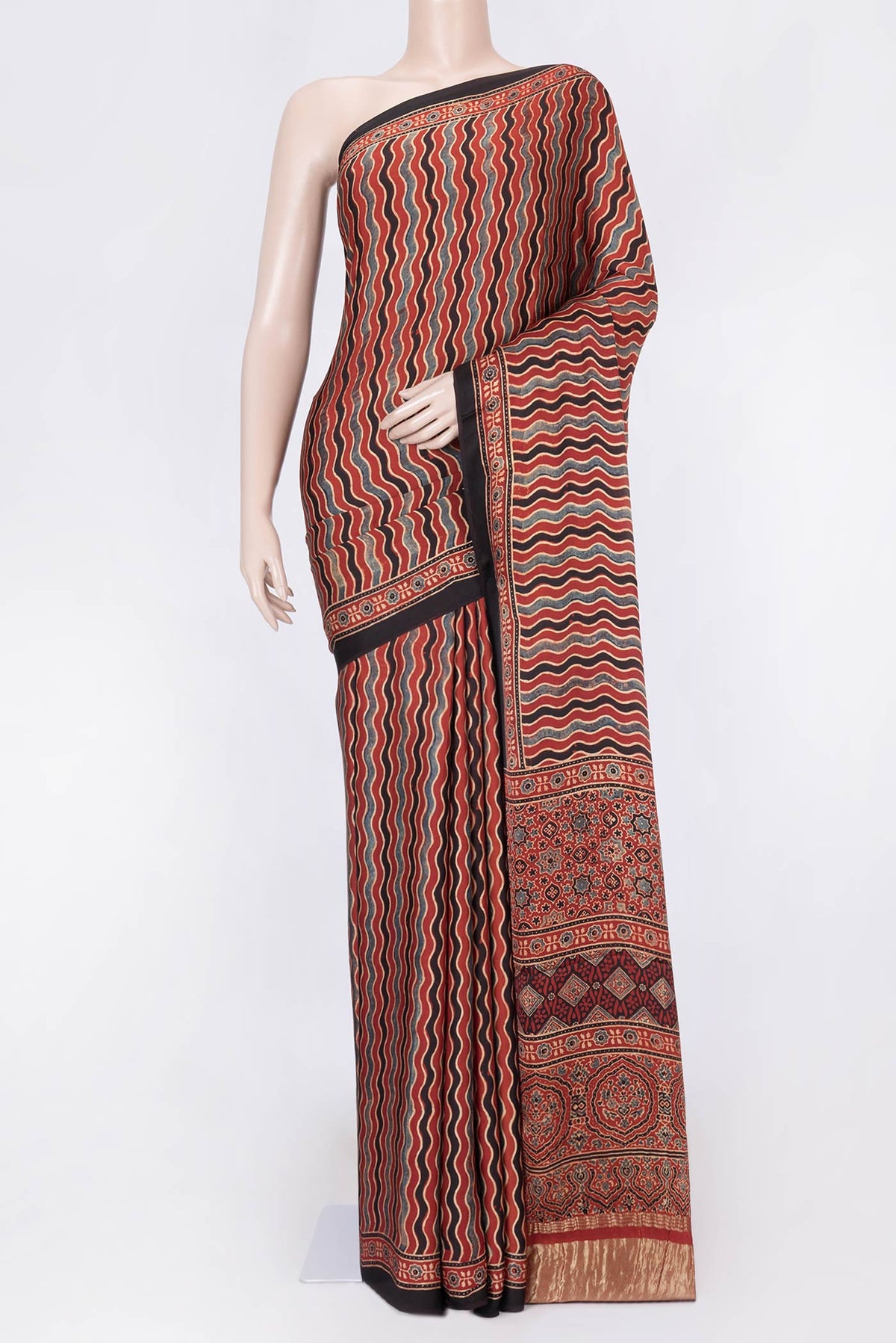 Maroon Dual Tone Linen Saree with Printed design on the body and Zari Border displayed on a mannequin