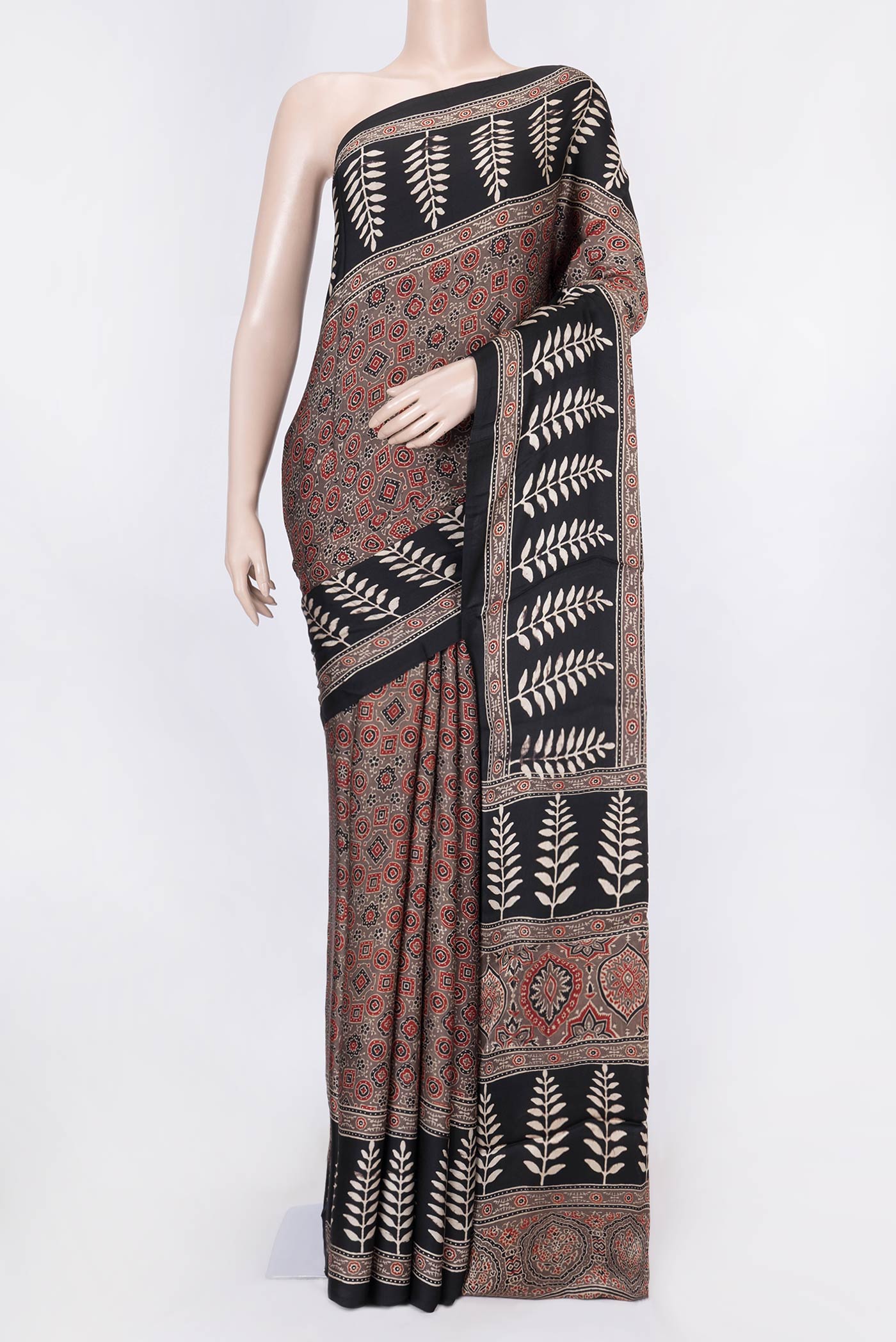 Brown Dual Tone Linen Saree with Printed design on the body and Zari Border displayed on a mannequin