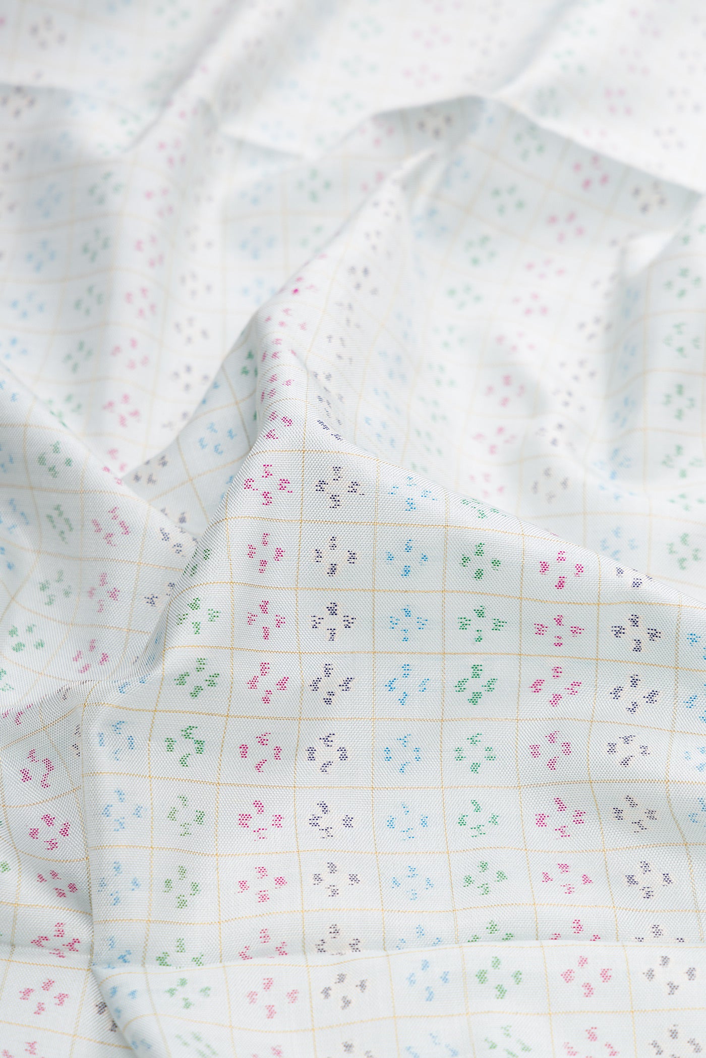 Close up of Light Blue Dual Tone Double Ikat Saree with Ikat Print on the body and Ikat Border.  displaying folds