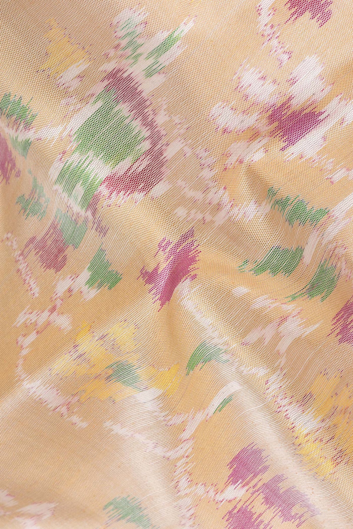 Close up of Pure Silk Sandal Double Ikat Saree with Pure Ikat on the body and Plain Border.  displaying folds