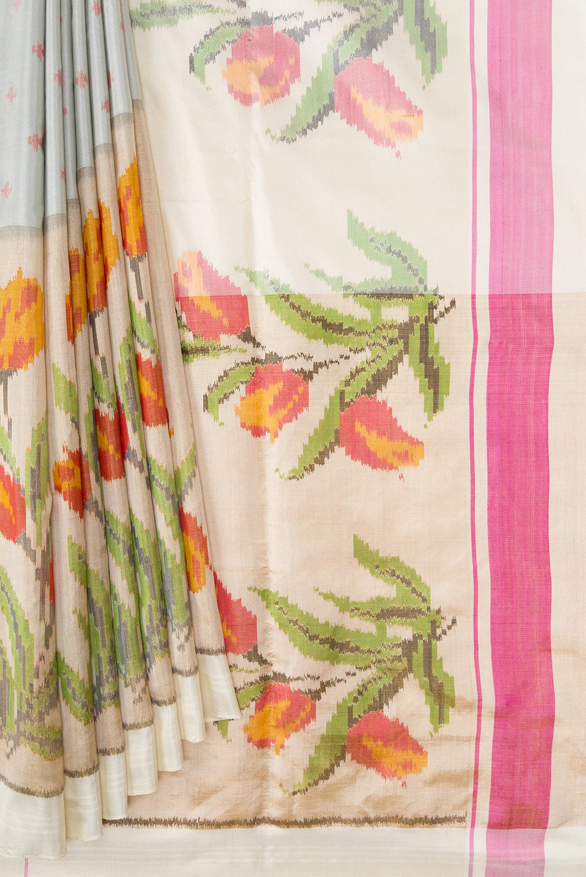 Pleats and pallu of Grey Dual Tone Kanjivaram Silk Saree with Ikat Print on the body and Ikat Border. 