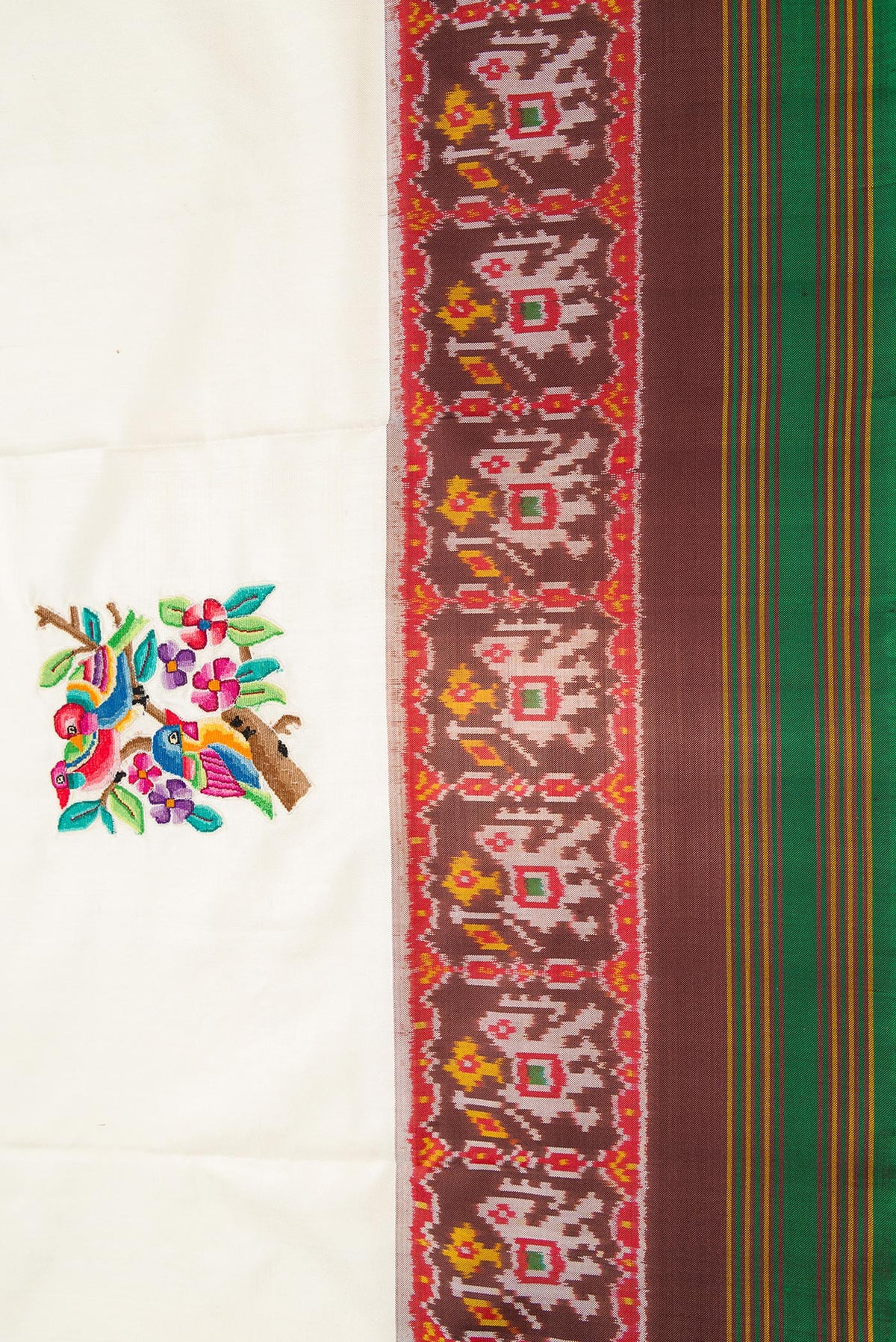 Border image of Off White Dual Tone Double Ikat Saree with Embroidery on the body and Ikat Border. 