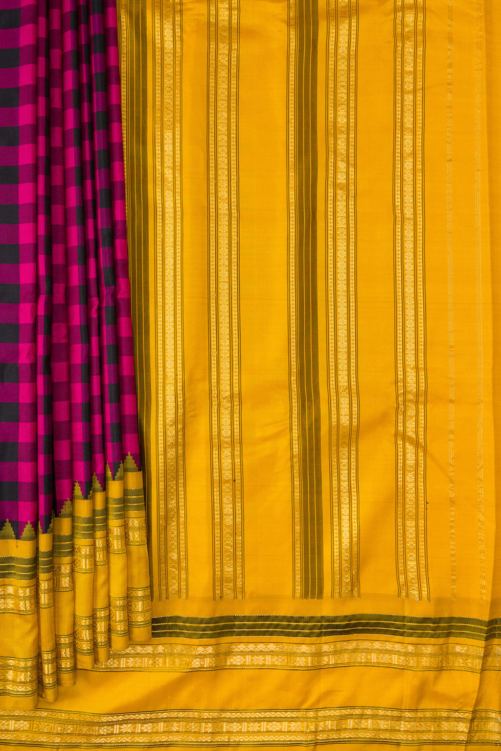 Pleats and pallu of Black and Pink Color Gadwal Silk Saree with Checked design on the body and Temple Border. 