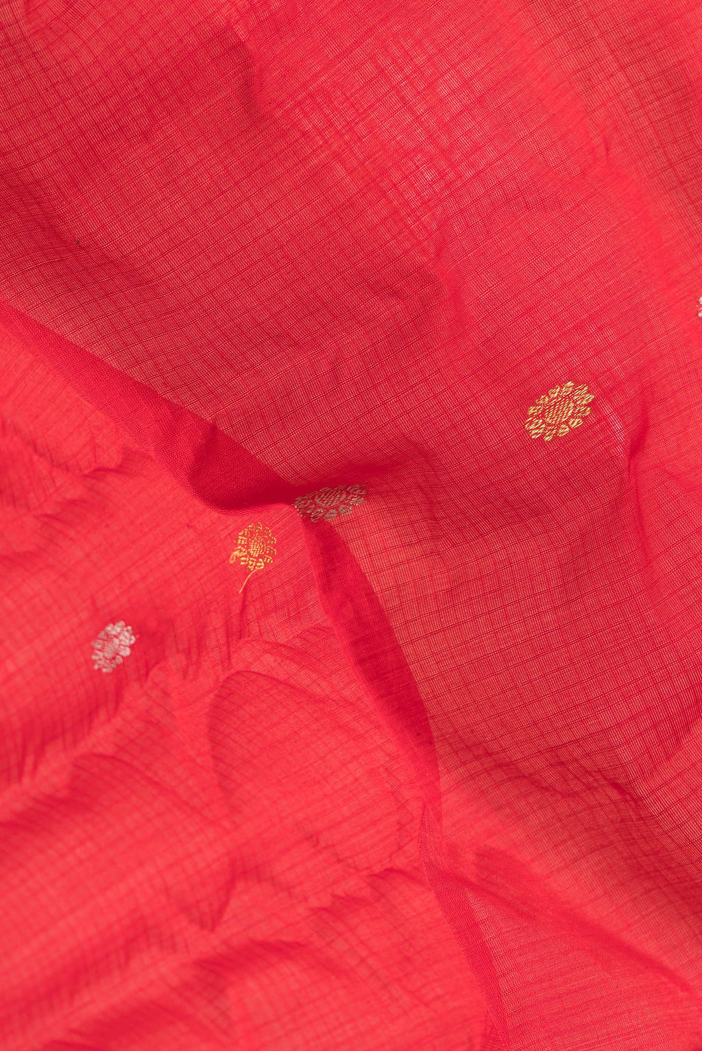 Close up of Red Dual Tone Gadwal Silk Saree with Checked design on the body and Zari Border.  displaying folds