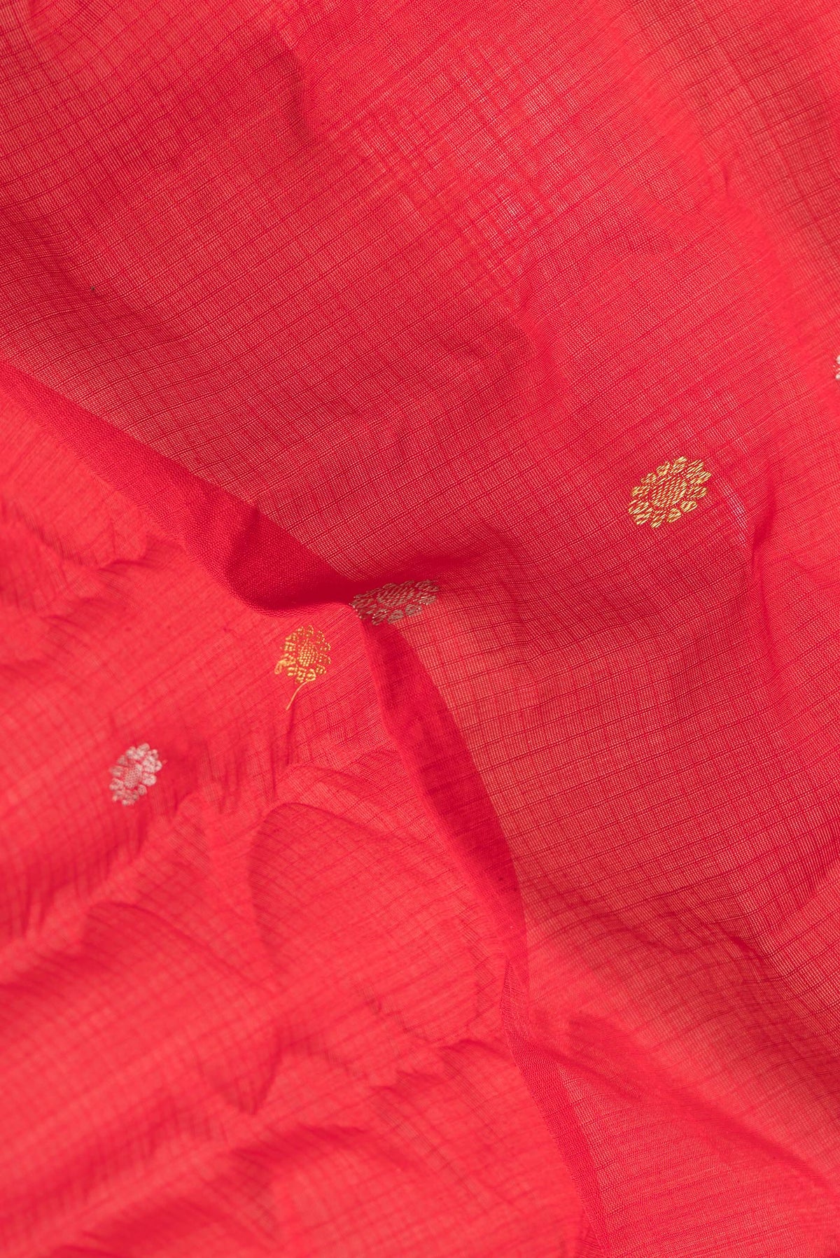 Close up of Red Dual Tone Gadwal Silk Saree with Checked design on the body and Zari Border.  displaying folds