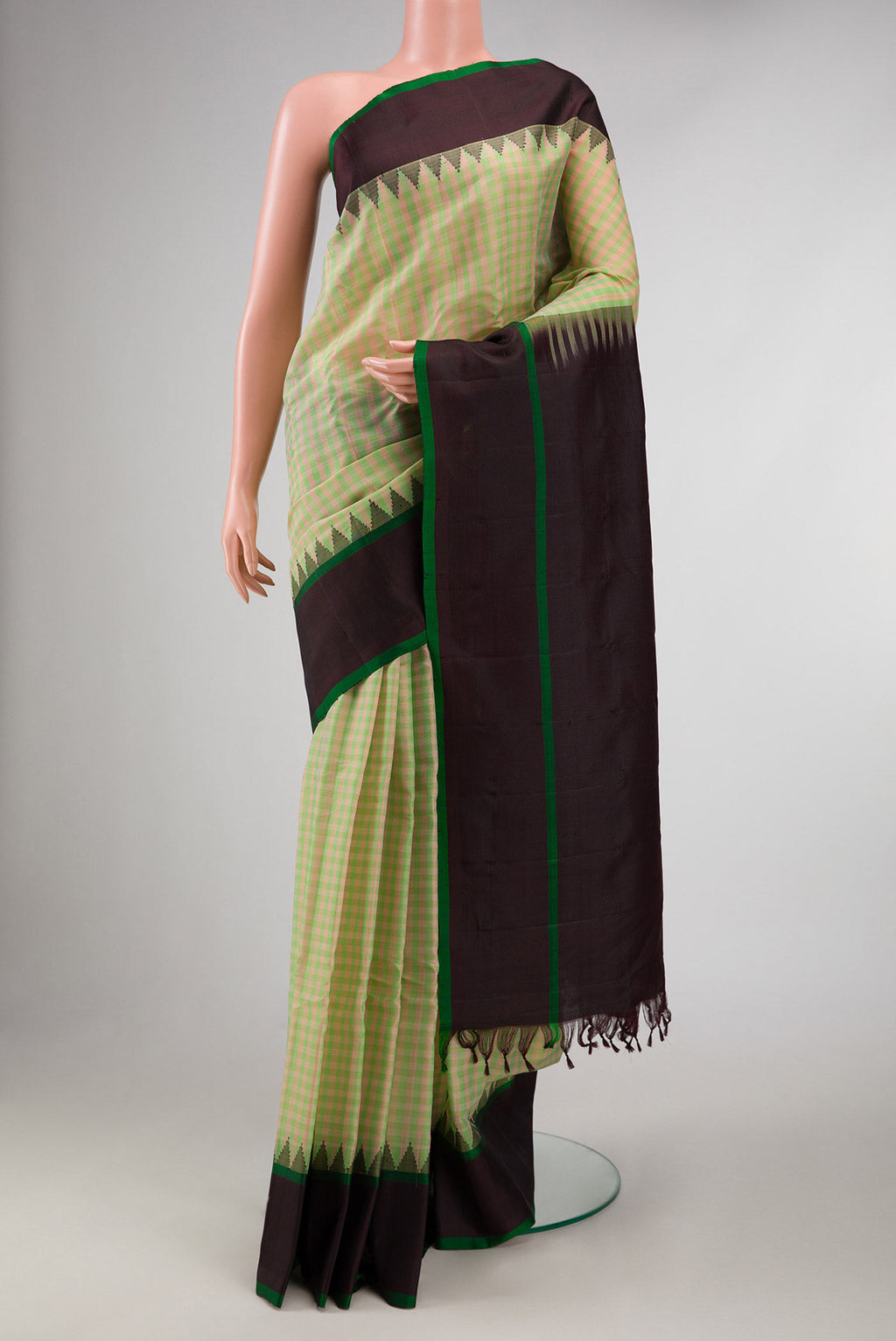 Green and Pink Color Gadwal Silk Saree with Checked design on the body and Thread Border displayed on a mannequin