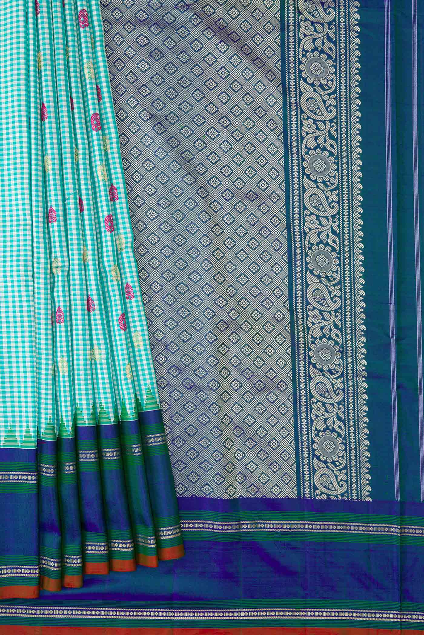 Pleats and pallu of Light Blue Gadwal Silk Saree with Checked design on the body and Zari Border