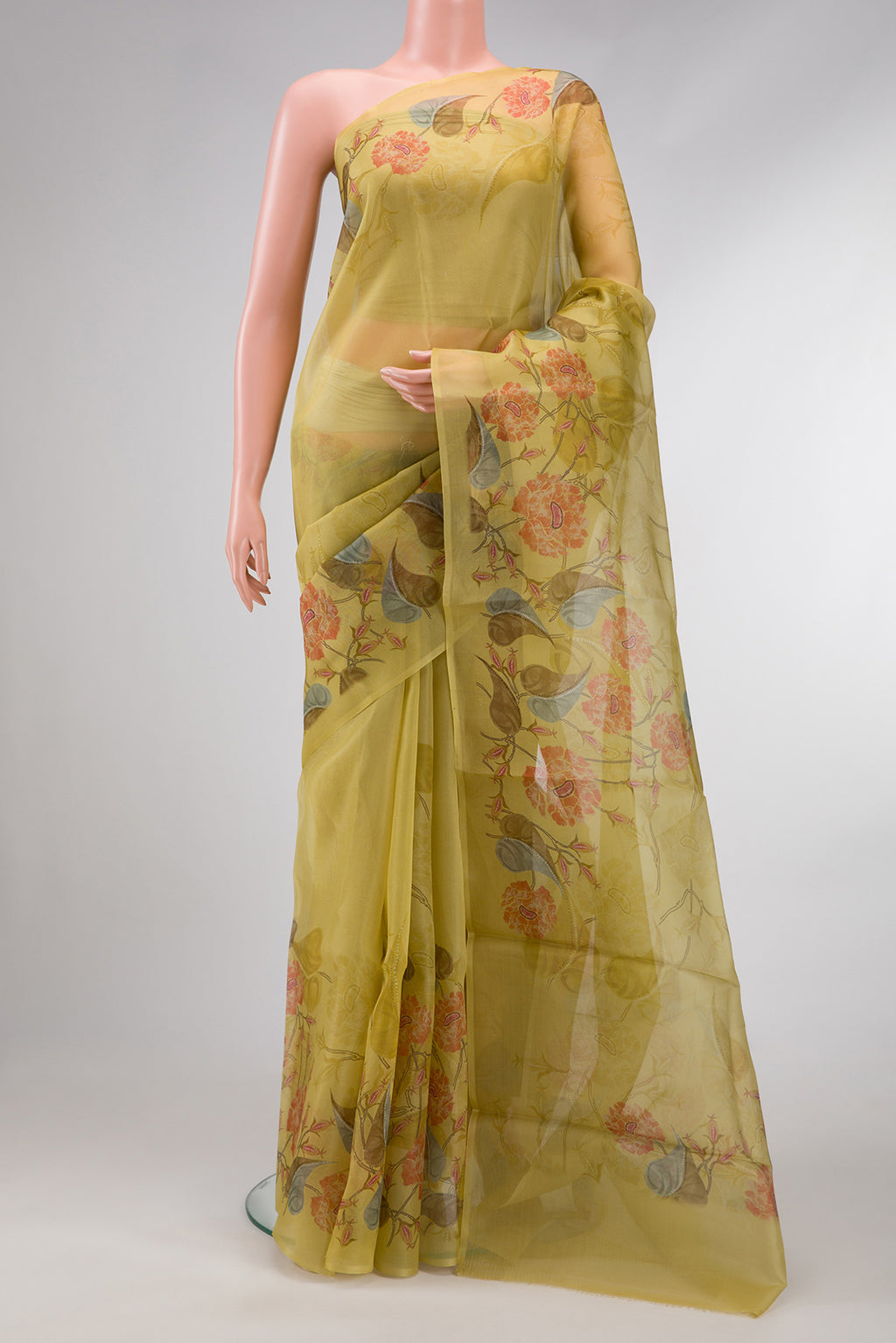 Mehandi Green Dual Tone Organza Silk Saree with Printed design on the body and Printed Border.  displayed on a mannequin