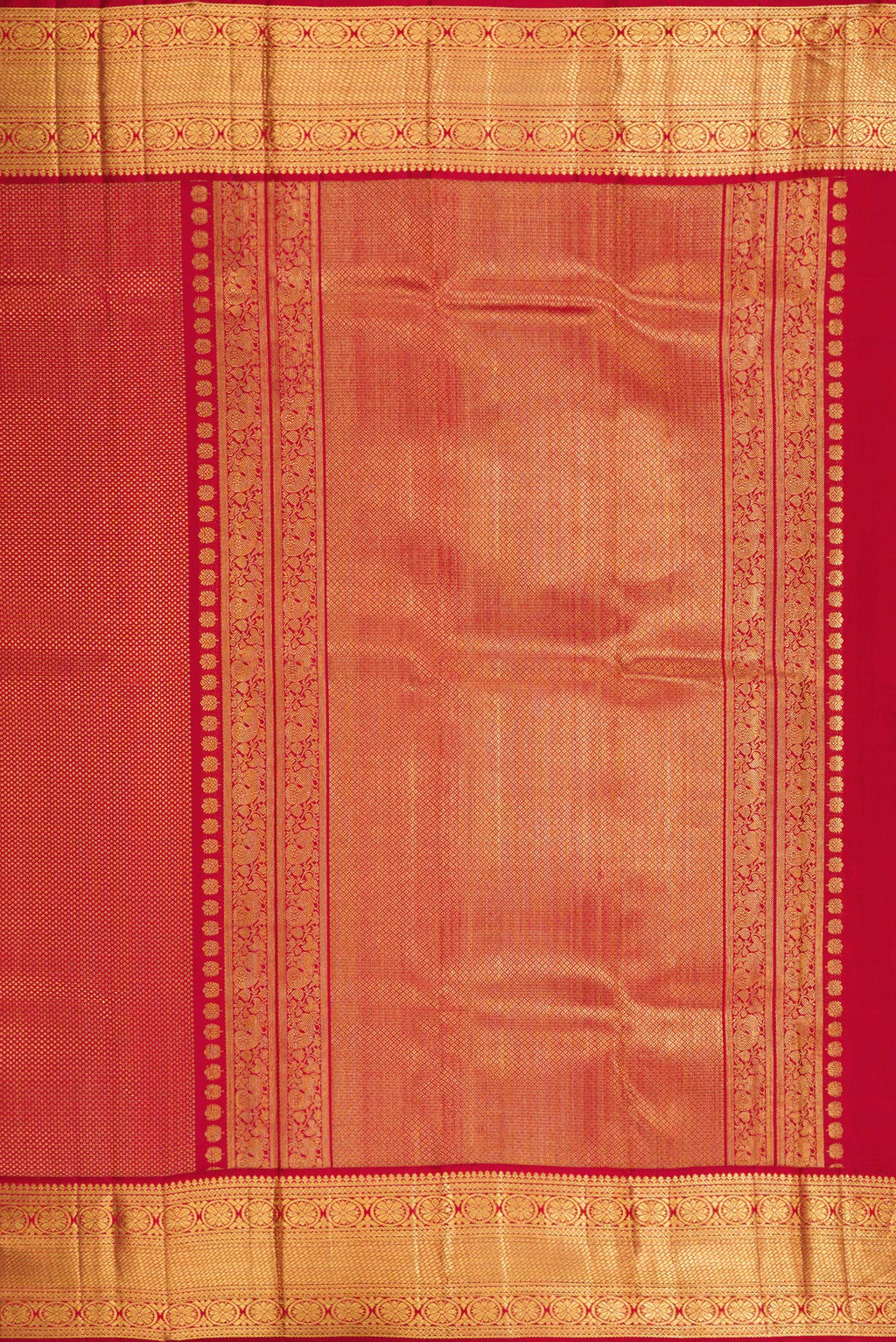 Close up image of the pallu of Maroon Kanchipuram Silk Saree with Zari Brocade on the body and Zari Border. 
