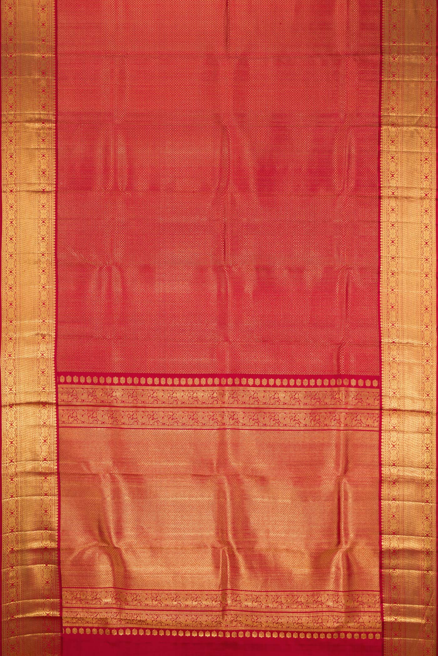 Flat view of Maroon Kanchipuram Silk Saree with Zari Brocade on the body and Zari Border. 