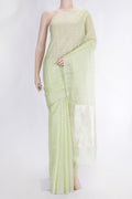 Pista Green Dual Tone Chanderi Tissue Silk Saree with Zari Butta on the body and Zari Border.  displayed on a mannequin