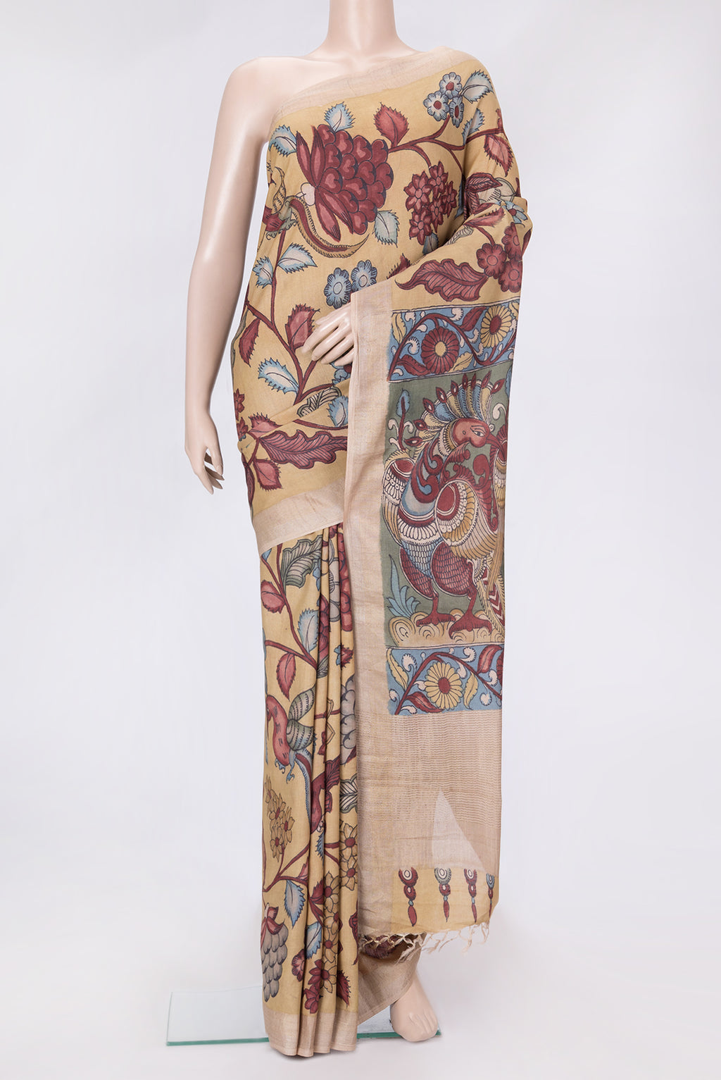 Dark Beige Dual Tone Tussar Silk Saree with kalamkari Print on the body and Zari Border.  displayed on a mannequin