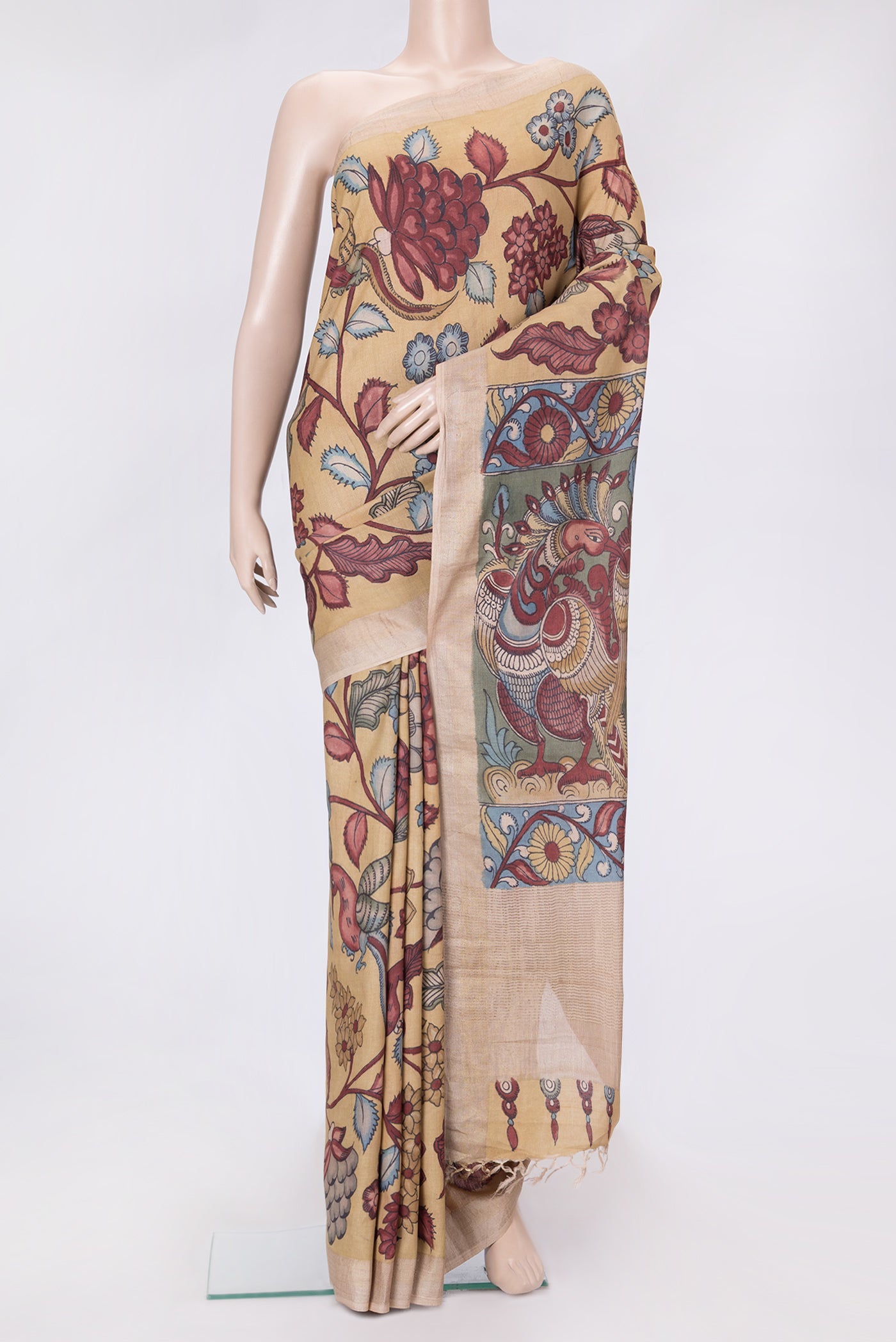Dark Beige Dual Tone Tussar Silk Saree with kalamkari Print on the body and Zari Border.  displayed on a mannequin