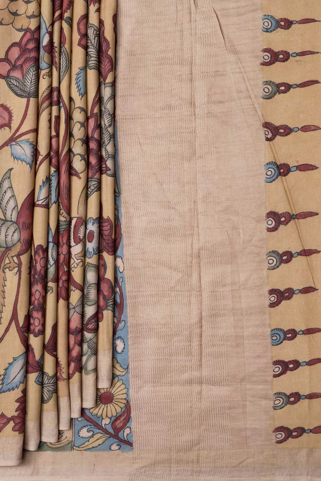 Pleats and pallu of Dark Beige Dual Tone Tussar Silk Saree with kalamkari Print on the body and Zari Border. 