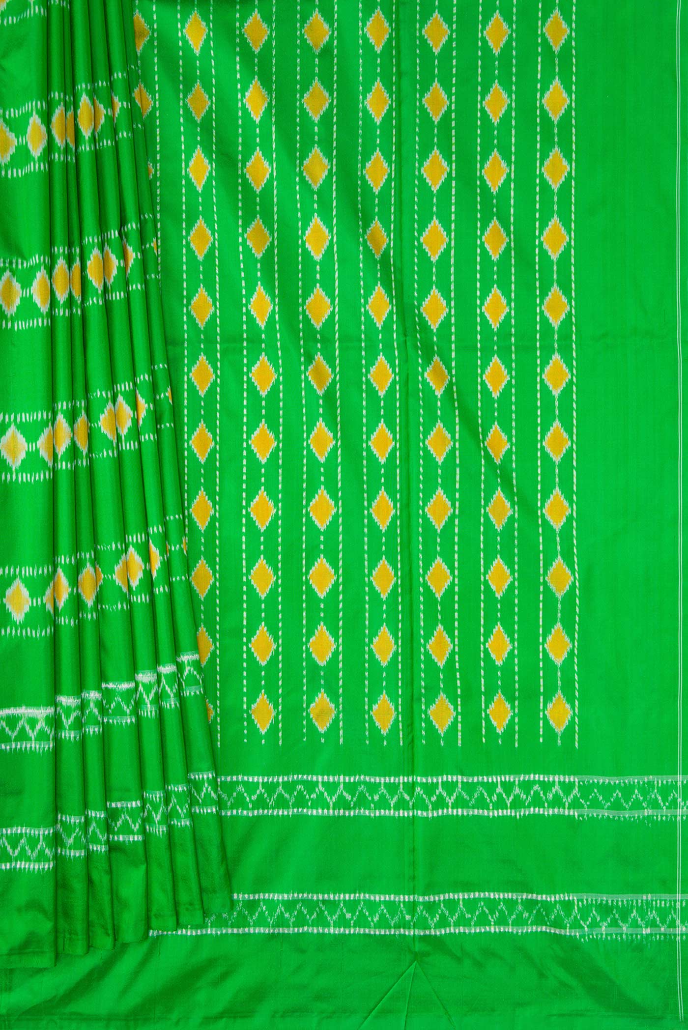 Pleats and pallu of Parrot Green Dual Tone Rajkot Patola Silk Saree with Ikat Print on the body and Ikat Border