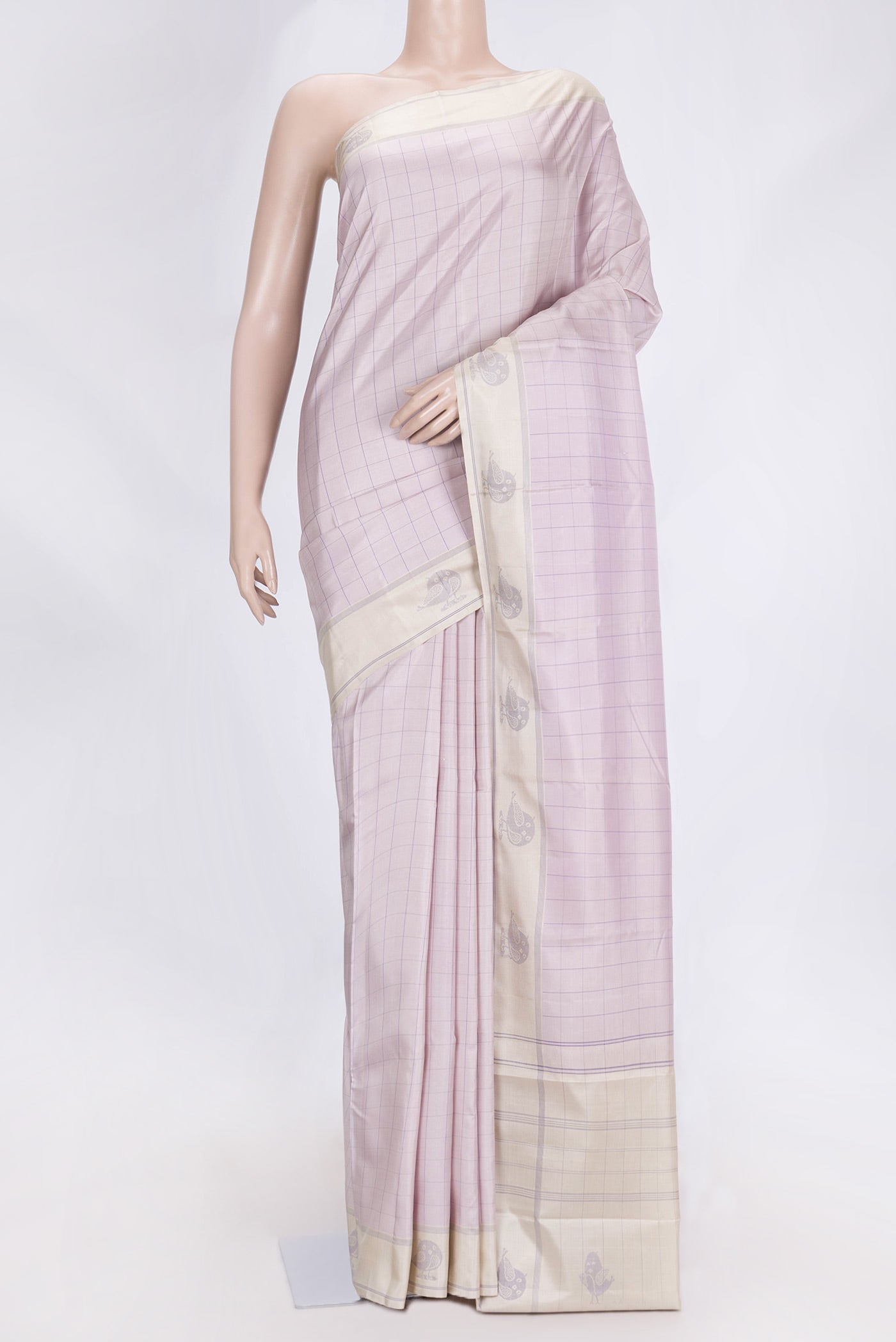 Lavender Dual Tone Kanchipuram Saree with Checked design on the body and Thread Border.  displayed on a mannequin