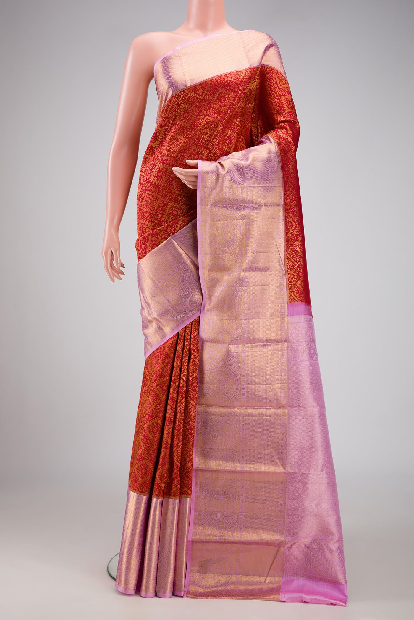 Dark Pink Dual Tone Kanchipuram Silk Saree with Zari Brocade on the body and Zari Border.  displayed on a mannequin