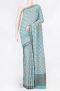 Sea Green Dual Tone Tussar Silk Saree with Printed design on the body and Zari Border displayed on a mannequin