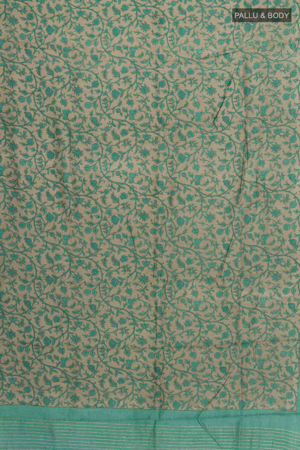 Flat view of Green Tussar Silk Saree with Printed design on the body and Zari Border