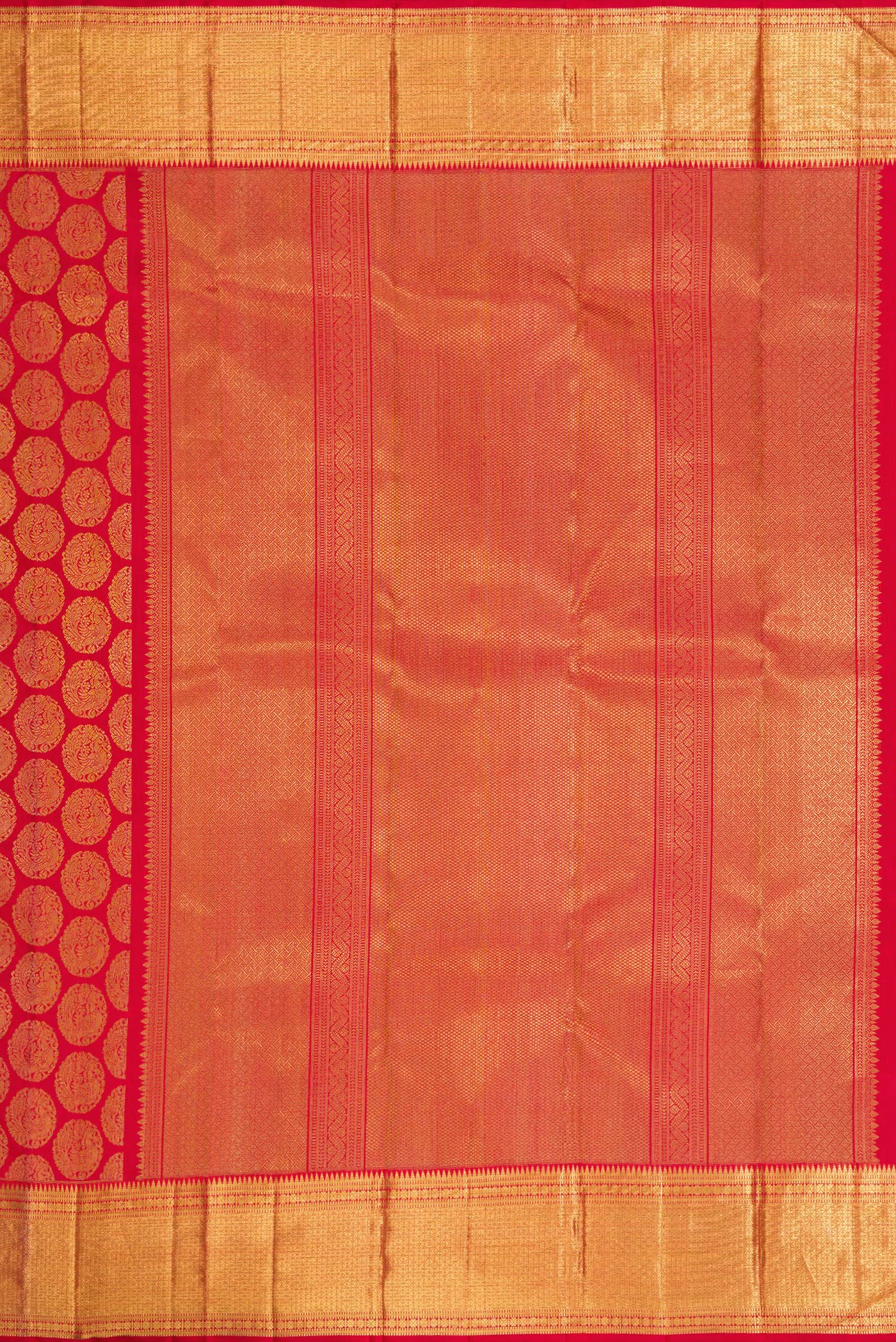 Close up image of the pallu of Pure Silk Pure Zari Red Dual Tone Kanjivaram Saree with Zari Brocade on the body and Zari Border. 