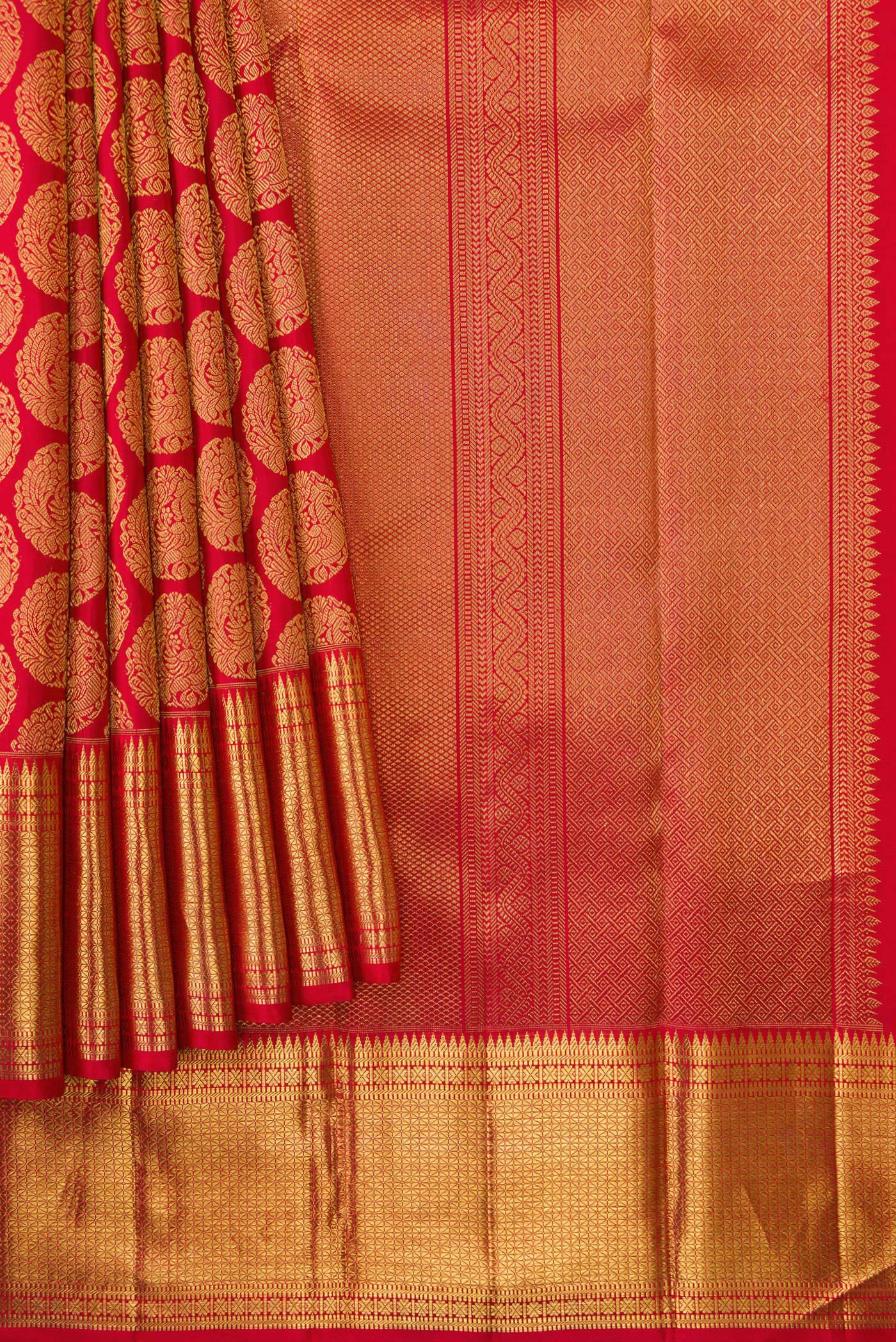 Pleats and pallu of Pure Silk Pure Zari Red Dual Tone Kanjivaram Saree with Zari Brocade on the body and Zari Border. 