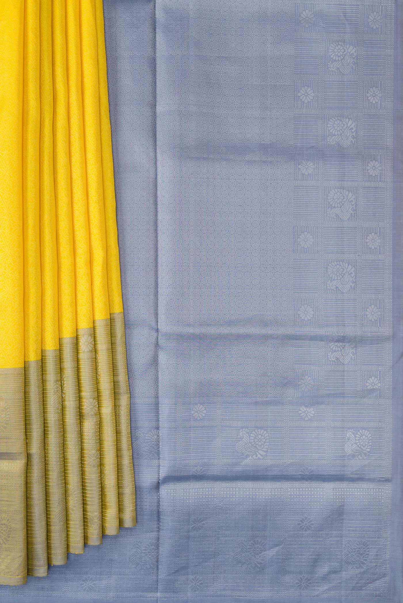 Pleats and pallu of Yellow Dual Tone Soft Silk Saree with Zari Brocade on the body and Zari Border. 