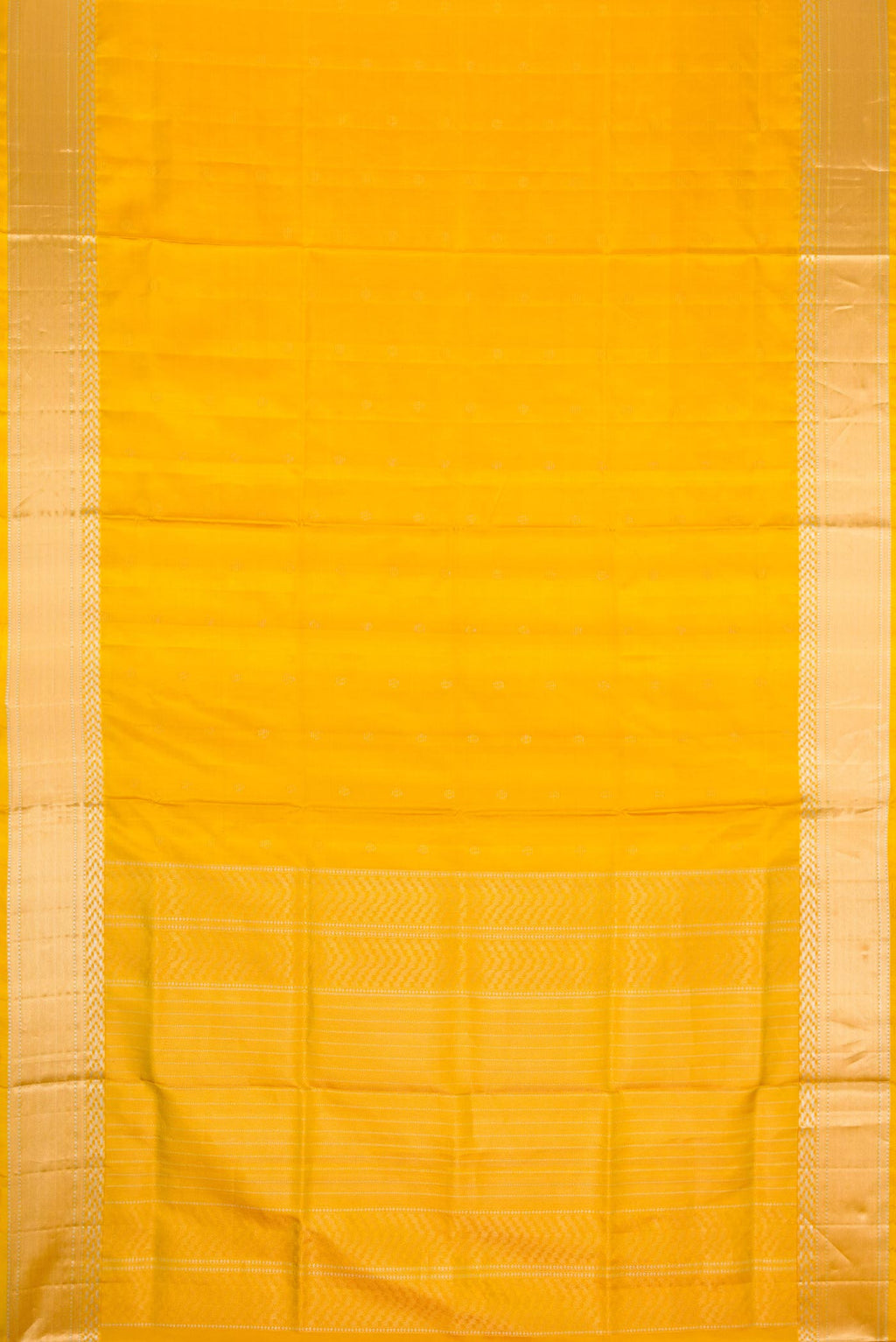 Flat view of Mustard Dual Tone Soft Silk Saree with Zari Butta on the body and Zari Border. 