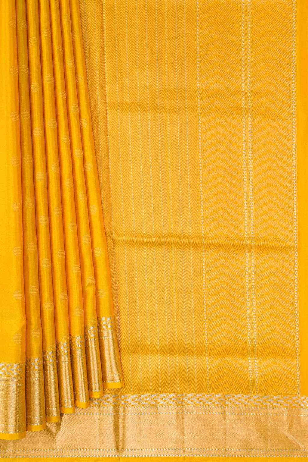 Pleats and pallu of Mustard Dual Tone Soft Silk Saree with Zari Butta on the body and Zari Border. 