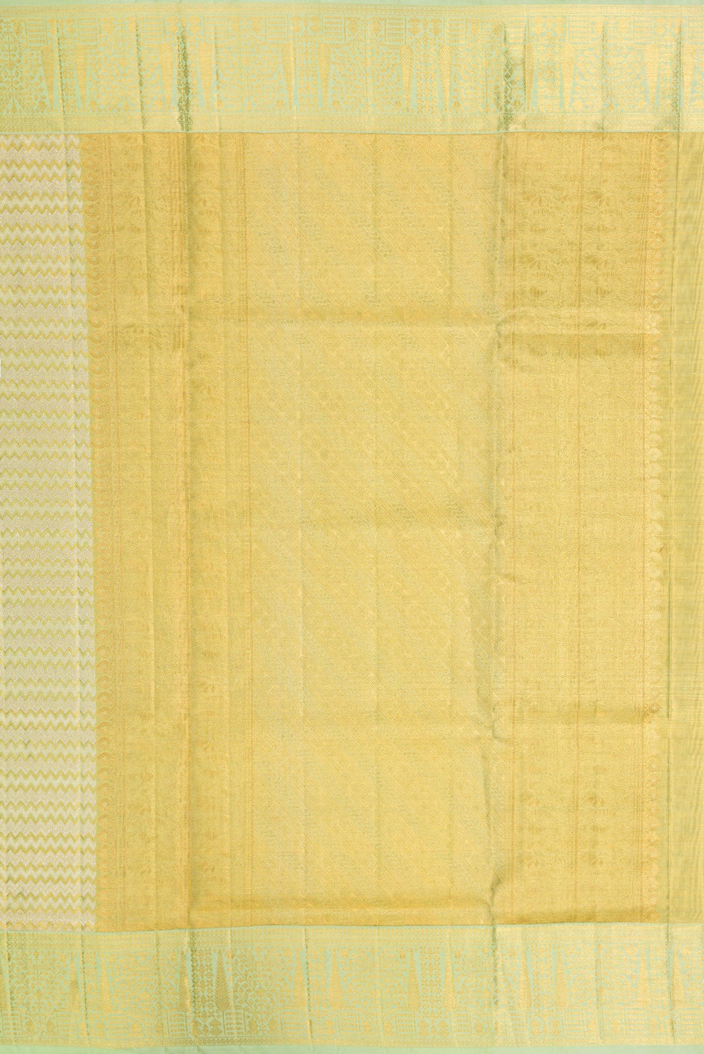 Close up image of the pallu of Pista Green Dual Tone Kanjivaram Tissue Silk Saree with Zari Brocade on the body and Zari Border. 