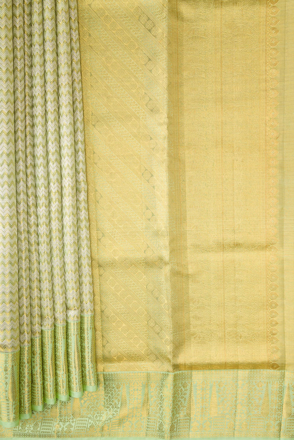 Pleats and pallu of Pista Green Dual Tone Kanjivaram Tissue Silk Saree with Zari Brocade on the body and Zari Border. 