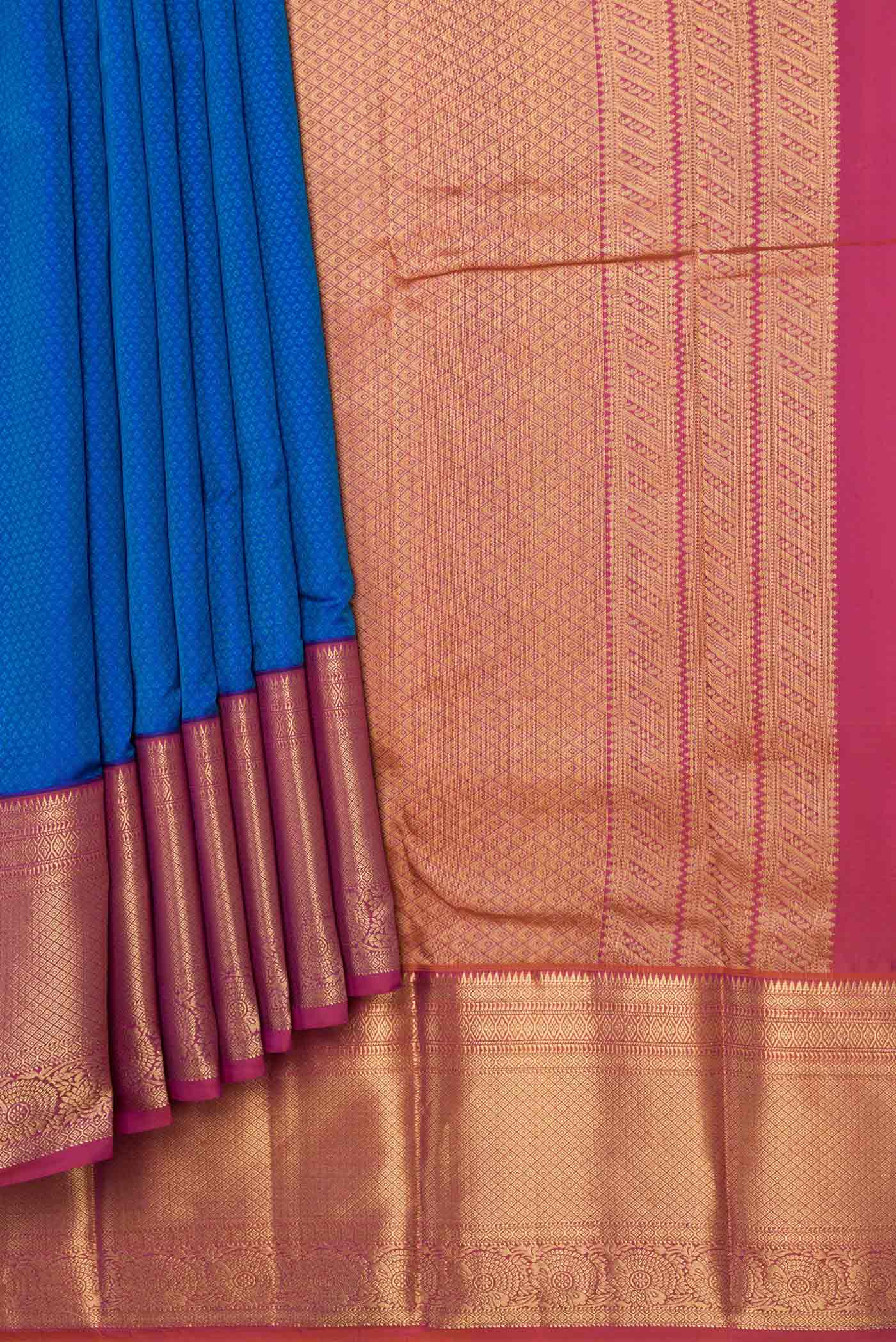 Pleats and pallu of Peacock Blue Dual Tone Kanchipuram Saree with Jacquard design on the body and Zari Border