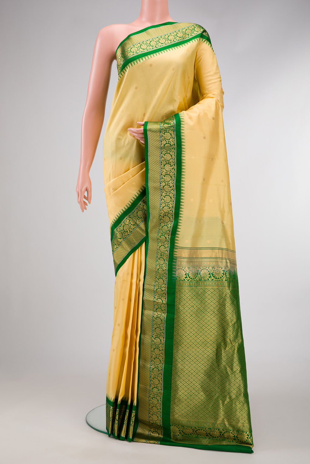 Sandal Dual Tone Gadwal Silk Saree with Zari Butta on the body and Zari Border.  displayed on a mannequin