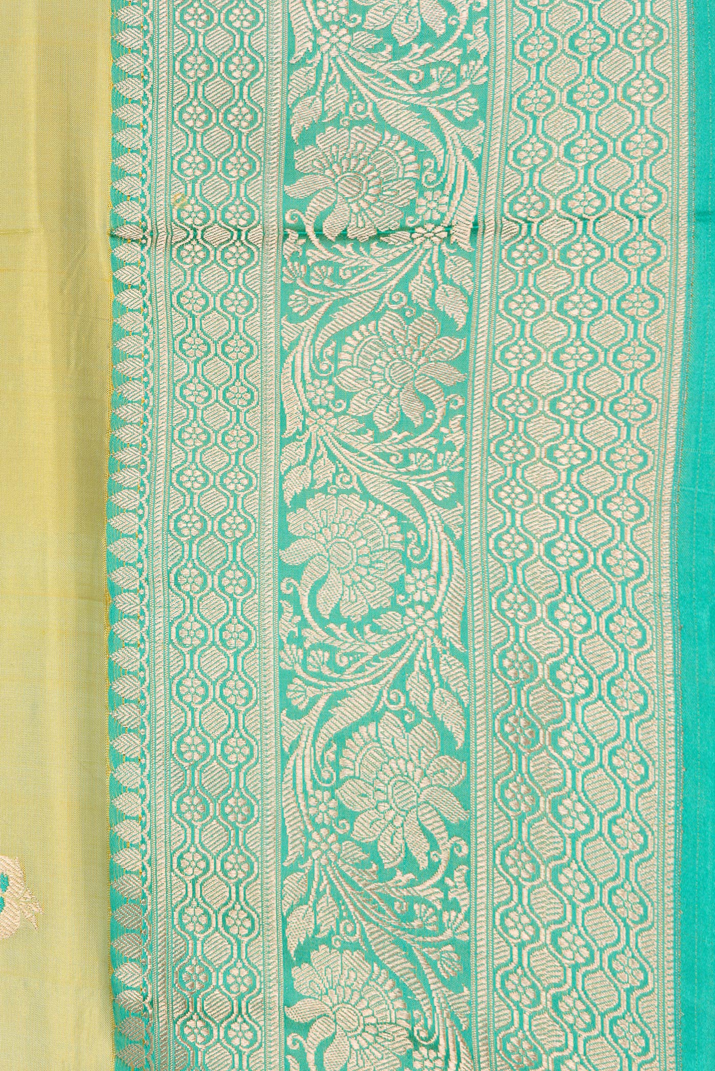 Border image of Pista Green Dual Tone Banarasi Silk Saree with Zari And Thread Butta on the body and Zari Border. 