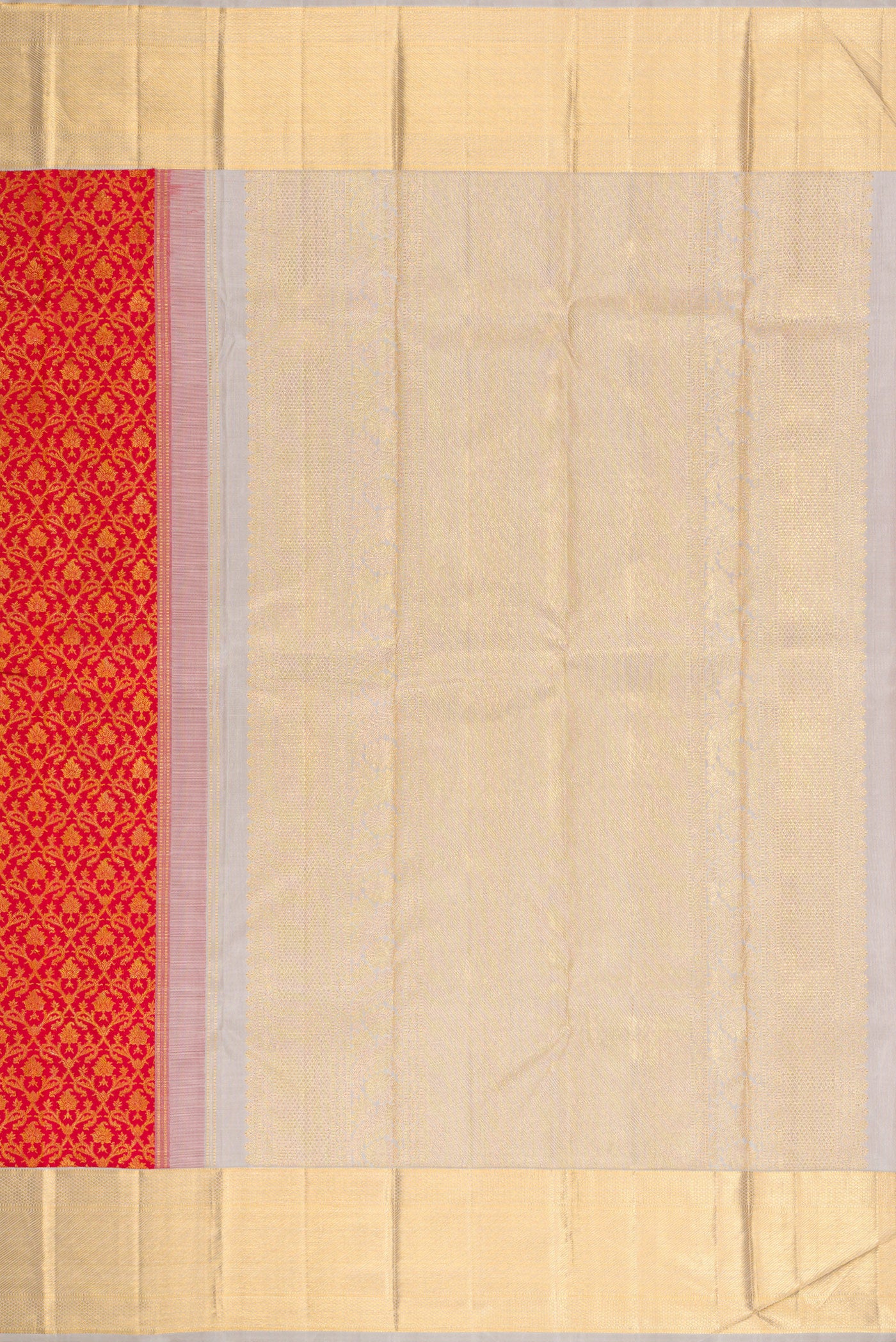 Close up image of the pallu of Red Dual Tone Kanchipuram Silk Saree with Zari Brocade on the body and Zari Border. 