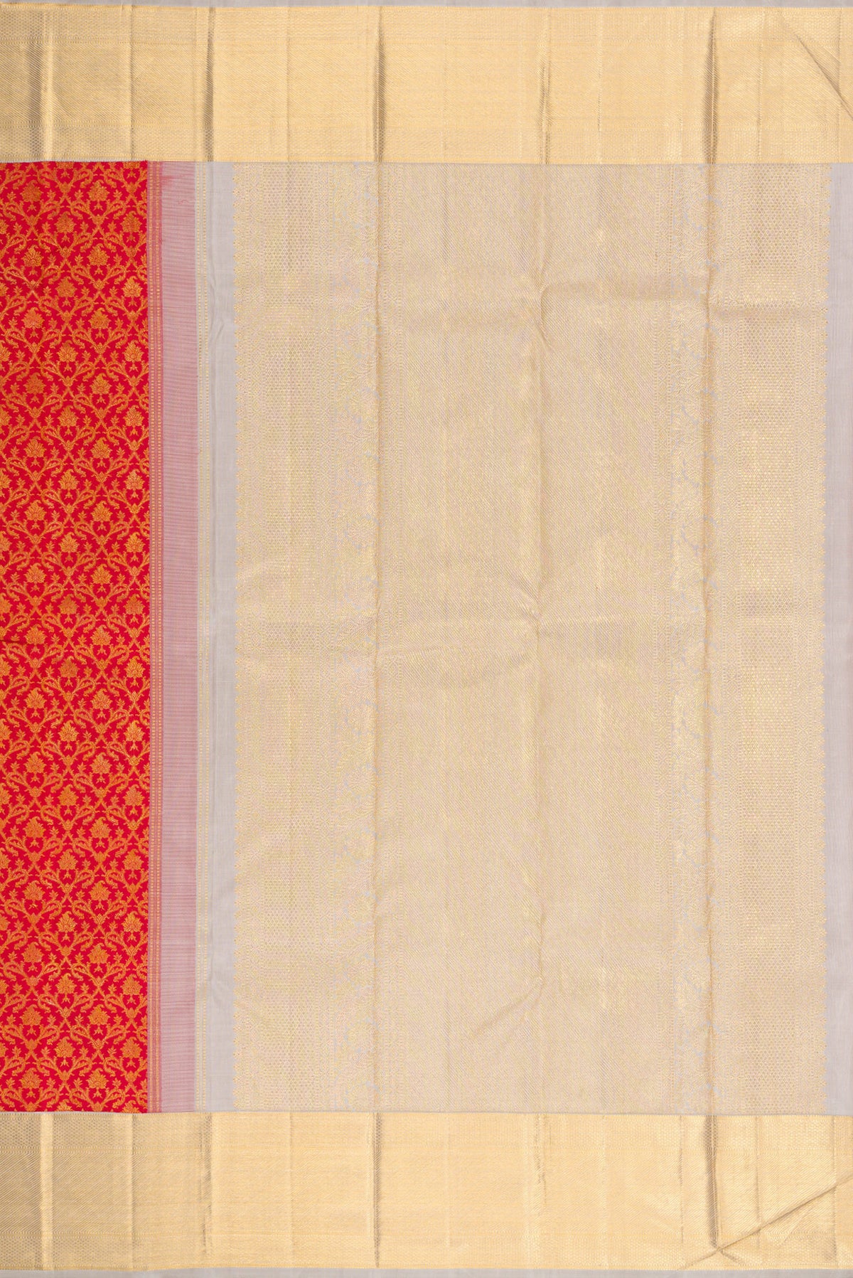 Close up image of the pallu of Red Dual Tone Kanchipuram Silk Saree with Zari Brocade on the body and Zari Border. 
