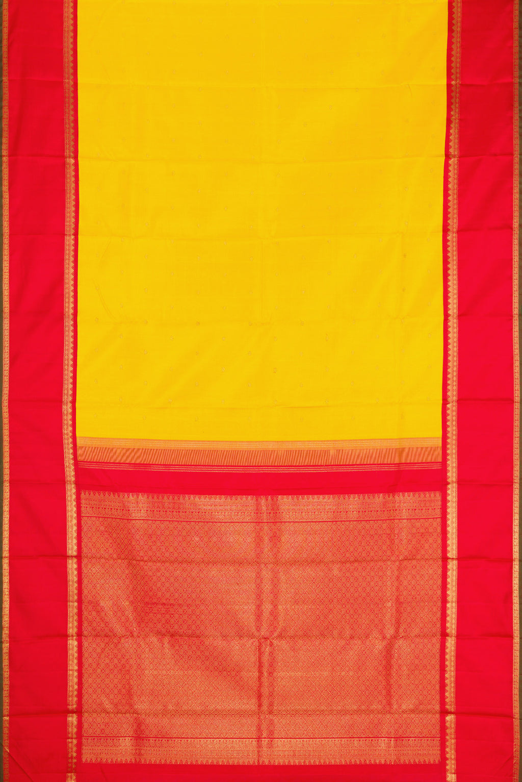 Flat view of Yellow Dual Tone Kanjivaram Silk Saree with Zari Butta on the body and Zari Border. 
