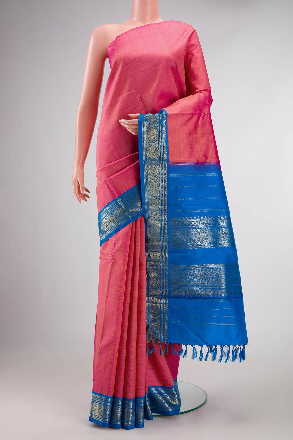 Pure Silk Pure Zari Pink Dual Tone Kanchipuram Saree with Plain Body and Zari Border displayed on a mannequin