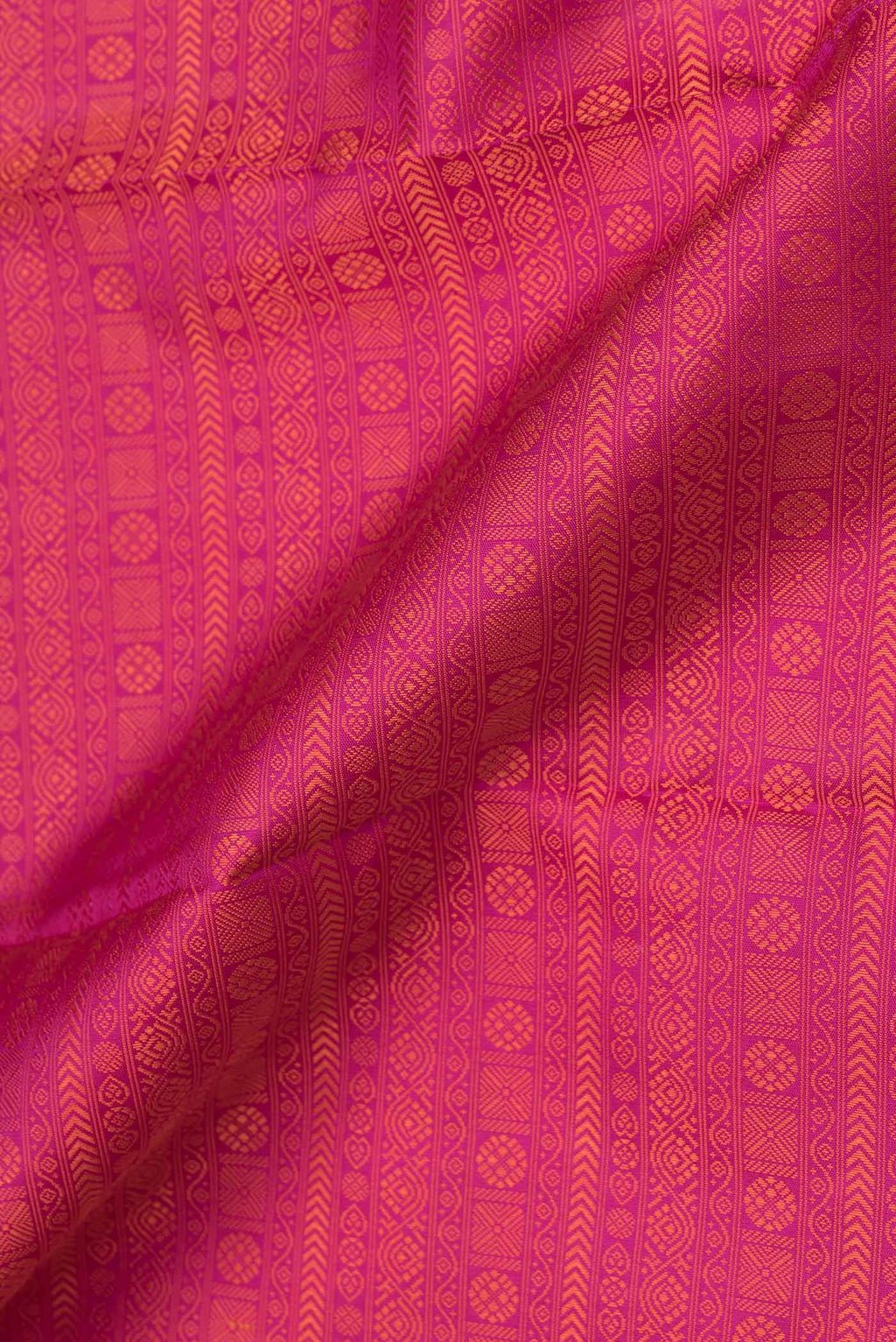 Close up of Pink Dual Tone Kanjivaram Saree with Jacquard design on the body and Plain Border.  displaying folds